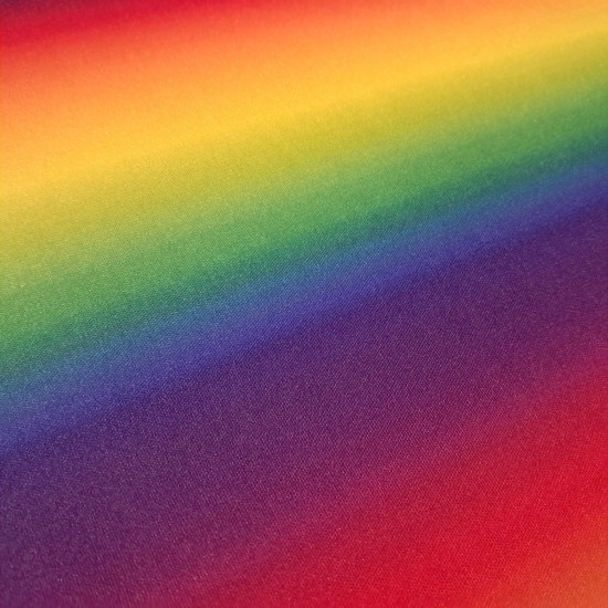 Polyester Jersey Rainbow fabric - Polyester jersey fabric with a rainbow pattern. The colored stripes run the width of the fabric. The fabric is 145 cm wide and is made of 100% polyester.
