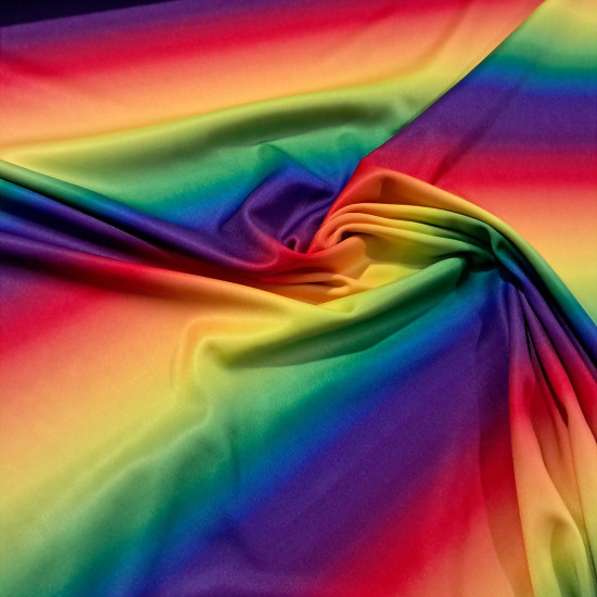 Polyester Jersey Rainbow fabric - Polyester jersey fabric with a rainbow pattern. The colored stripes run the width of the fabric. The fabric is 145 cm wide and is made of 100% polyester.