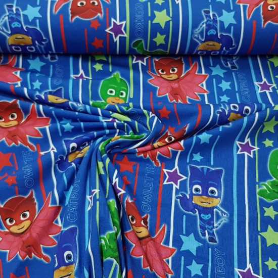 Cotton Jersey PJ Masks Stripes Stars fabric - Licensed cotton jersey fabric with drawings of the PJ Masks characters on a background with stripes and stars in various colors on a blue background. The fabric is 160cm wide and its composition is 95% cotton 