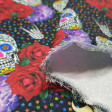 Burlington Skulls Multicolor Dots fabric - Stretch / burlington polyester fabric with skulls, roses and multicolored polka dots on a black background. The fabric is 150cm wide and its composition is 100% polyester.
