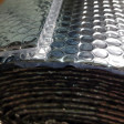 Isothermal Insulated fabric - Isothermal and insulating fabric consisting of a layer of 'bubbles' on the inside and the outer layers 'silver'. It can be used to insulate from cold or heat in the manufacture of cooler bags, bottle cove
