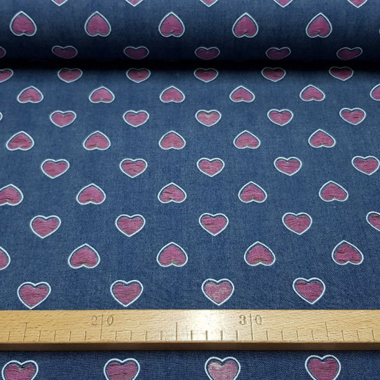 Denim Fine Hearts fabric - Fine cotton denim fabric with openings in heart patterns, practically exposed. The fabric is 150cm wide and its composition is 100% cotton