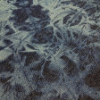 Denim Jeans Tie-Dye 7,5oz fabric Close-up of 7.5 oz cotton denim fabric with a tie-dye pattern in shades of indigo and light blue