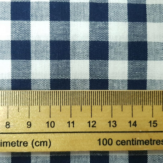 Gingham Cotton 9mm fabric - Cotton fabric with a 9mm Vichy square pattern. The fabric is 145cm wide and its composition is 100% cotton.