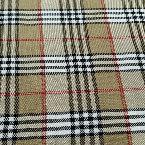 Viella Scottish CheckBeige fabric - Viella fabric with Scottish check in beige and brown Burberry style. The fabric is 150cm wide and its composition 65% polyester - 35% viscose