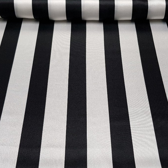 Satin Black Stripes fabric - Satin fabric, bright on one side and with a lot of fall. Wide stripe print in black with various color combinations to choose from. The fabric is 150cm wide and its composition 100% polyester.