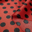 Carnival Satin Ladybug Polka Dot fabric - Carnival satin or trilobal fabric with black polka dot patterns on a red background, imitating the ladybug insect. Ideal for Ladybug’s character costume, for example. The fabric is 150cm wide and its composition 1