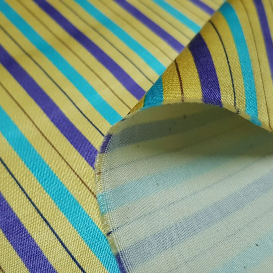 OUTLET Elastic Satin Stripes fabric - Bright satin fabric with elasticity in which there are lilac, blue and brown stripes on a gold / ocher background. The fabric is 110cm wide and its 100% polyester composition. Fabric Outlet Cheap Clearance