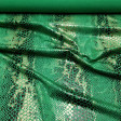 Lycra Snake Green fabric - Stretch lycra fabric with snake skin motifs in black and green. The snake lycra fabric is ideal for dressmaking, for dancing, shows ... The fabric is 150cm wide and 92% polyester - 8% spandex.