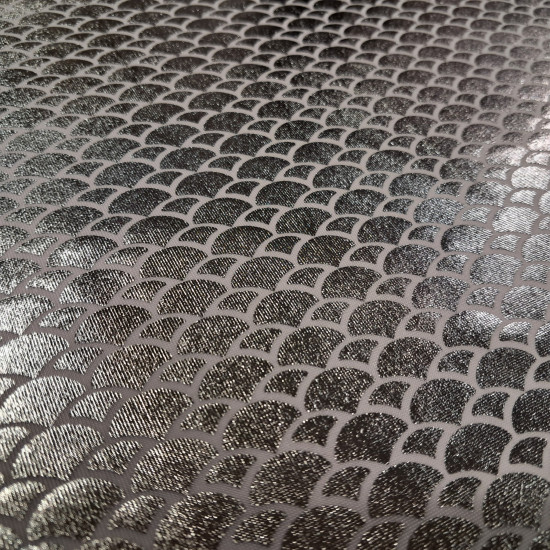 Lycra Mermaid Scales fabric - Fine stretch lycra fabric with drawings of bright mermaid scales in white/silver colors. The fabric is 150cm wide and its composition 97% polyester - 3% spandex