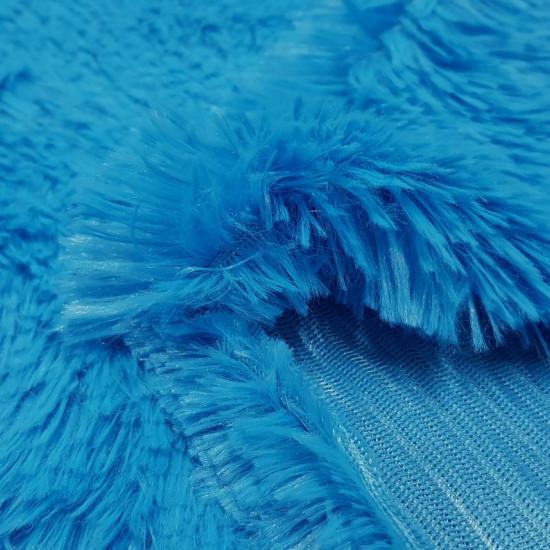 Fur Monster fabric - Monster fur fabric, a bit long and with a soft touch. Monster fur fabric is ideal for making costumes and home decorations such as cushions. The fabric is 150cm wide and its composition 100% polyester.