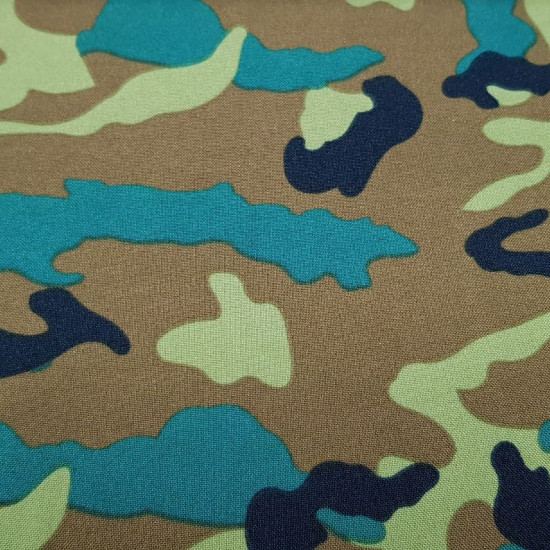 Burlington Camouflage fabric - Burlington / Bi-stretch fabric with camouflage print in green tones. The fabric is 150cm wide and its composition 100% polyester.