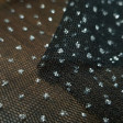 Tulle Dots Glitter Stell fabric - Nylon tulle fabric with irregular glitter dots. A fabric for ideal complement of costumes and party decorations. The fabric is 150cm wide and its composition 100% nylon