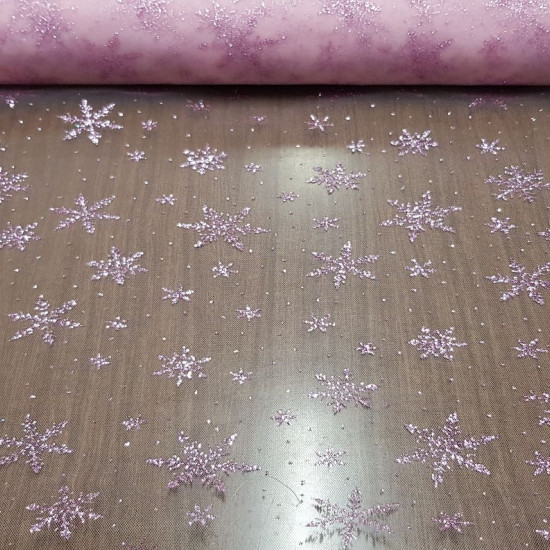 Tulle Pink Snowflakes fabric - Semi-transparent pink tulle fabric with bright pink glitter snowflakes. It is a very suitable fabric for decorations and costumes of princesses and fairies for example ... The fabric is 150cm wide and its composition