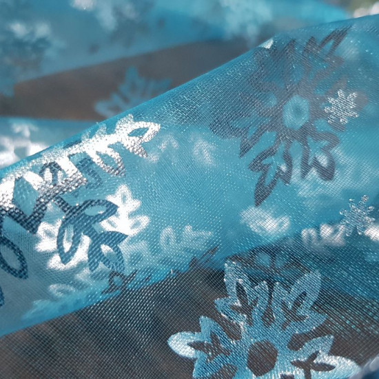 Organza Snowflakes Foil Turquoise fabric - Semi-transparent turquoise blue organza fabric with foil silver snowflakes in 