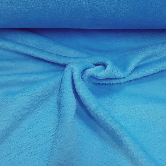 Coral Fleece Uni fabric - Coral fleece fabric with a softer touch and with more hair than fleece. Coral fleece is widely used to make blankets, buff collars and much more. The fabric is 150cm wide and its composition is 100% polyester.