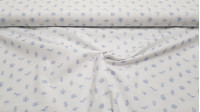 Tela Algodón Plantas Lino - Tela de algodón fina imitando al lino con dibujos de plantas y ramas de vegetación de color azul sobre un fondo blanco. La tela mide 150cm de ancho y su composición 100% algodón.