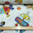 Tela Loneta Robots - Tela de loneta infantil muy divertida con dibujos de robots y piezas mecánicas sobre un fondo claro tirando a blanco con formas de piezas contorneadas en gris. La tela mide 280cm de ancho y su composición 70% algodón