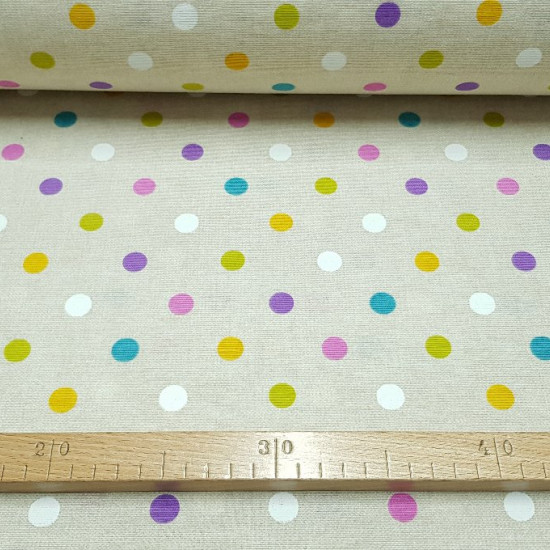 Canvas Polka Dots Multicolor fabric - Very funny canvas fabric with drawings of moles or polka dots of various colors on a beige background. You can use this canvas fabric for a multitude of creations, whether they be bags, children's decorations, cushion