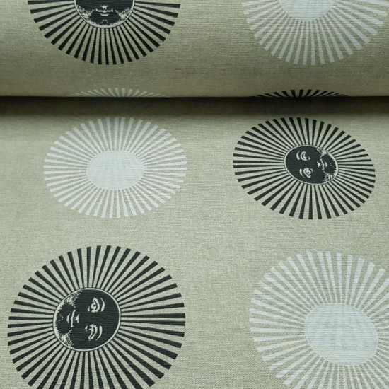 Canvas Suns White Black fabric - Decorative canvas fabric, ideal for cushions, curtains and other home decoration. Drawings of suns with black and white faces appear on the fabric on a beige background. The fabric is 280cm wide and its composition 7