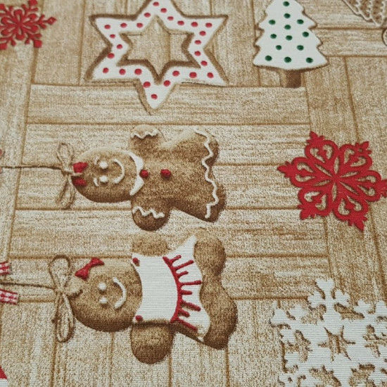 Canvas Christmas Cookies fabric - Christmas style canvas fabric with drawings of gingerbread cookies in the shape of dolls, stars, hearts... and more Christmas ornaments such as candy canes, holly, pineapples and socks on a background imitating wood.