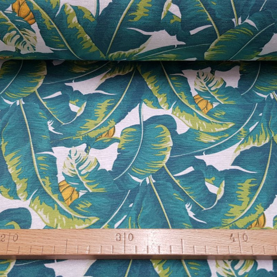 Canvas Banana Leaves fabric - Decorative canvas fabric with drawings of large banana leaves. The fabric is 280cm wide and its composition is cotton - polyester