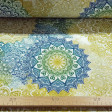 Tela Loneta Mandalas Colores Degradado - Tela de loneta decorativa con dibujos coloridos de mandalas en varios tonos haciendo efecto degradado. La tela mide 280cm de ancho y su composición 50% poliester- 50% algodón.
