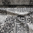 Canvas Black White Tiles fabric - Decorative canvas fabric with drawings of tiles or hydraulic racholas in black and white tones. The fabric is 280cm wide and its composition is 50% cotton - 50% polyester.