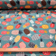 Loneta estampada piñas multicolor por metros Tela de loneta verde azulado con estampado de piñas geométricas de colores