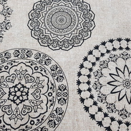 Canvas Large Mandalas Black fabric - Decorative canvas fabric with large drawings of mandalas in black on a culla background. The fabric is 280cm wide and its composition is 70% cotton - 30% polyester.