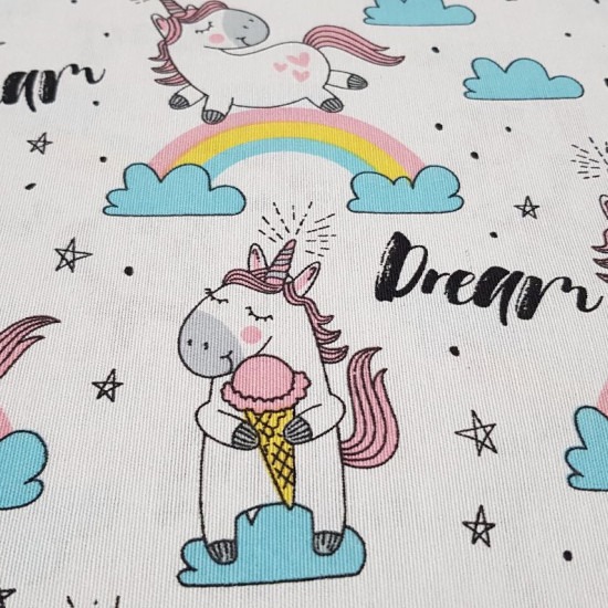 Canvas Dream Unicorn fabric - Decorative canvas fabric with children's drawings of unicorns and rainbows, clouds and stars, on a white background with words 