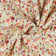 Double Gauze Little Flowers fabric - Organic cotton double gauze fabric with flower drawings in various colors. A soft and light fabric ideal for children's clothing and dresses. The fabric is 135cm wide and its composition is 100% cotton.