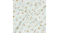 Tela Doble Gasa Hojas - Tela muselina o doble gasa algodón orgánico con dibujos de hojas de colores sobre un fondo blanco. La tela mide 135cm de ancho y su composición 100% algodón.