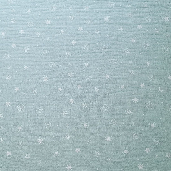 Double Gauze Space Stars fabric - Double gauze cotton fabric with drawings of various types of stars that remind us of space, on a colored background. The fabric measures 135cm wide and its composition is 100% cotton.