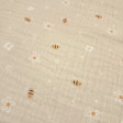 Double Gauze Bees Flowers fabric - Very lightweight double gauze cotton fabric with bee and flower designs on a beige background. The fabric is 135cm wide and 100% cotton.