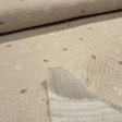 Double Gauze Bees Flowers fabric - Very lightweight double gauze cotton fabric with bee and flower designs on a beige background. The fabric is 135cm wide and 100% cotton.