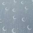 Tela Doble Gasa Lunas - Tela de doble gasa o muselina con dibujos de lunas sobre un fondo gris. La tela mide 135cm de ancho y su composición 100% algodón.