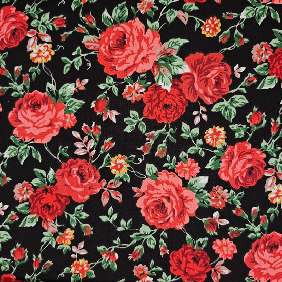 Cotton Poplin Peasant Flowers fabric - Cotton poplin fabric with a typical peasant floral design, shades of red on a black background. The fabric is 150 cm wide and is made of 100% cotton.