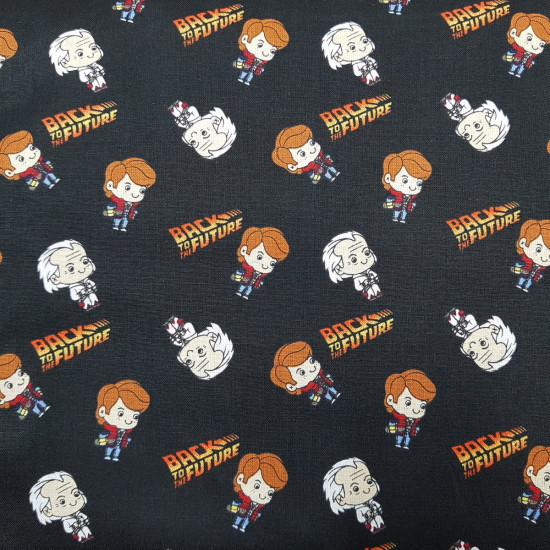 Cotton Back to the Future fabric - Patchwork poplin cotton fabric with drawings representing the characters Marty McFly and Doc from the long-awaited movie Back to the Future, and logos of the movie on a black background. The fabric measures 110cm wid