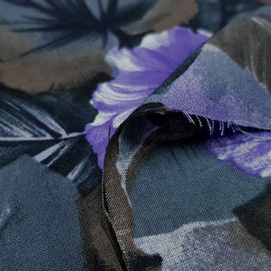 Viscosilla Flowers Lilacs Gray Brown fabric - Viscosilla fabric printed with drawings of flowers and large leaves, where lilac, gray and brown colors predominate. The fabric is 150cm wide and its composition is 100% fibranne.