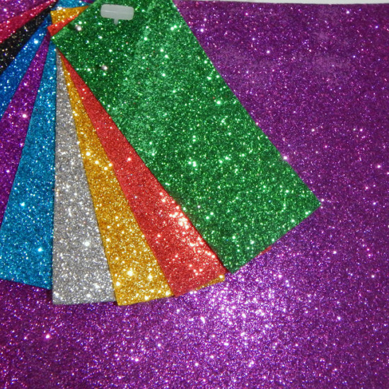 Foamy Glitter fabric - Foamy is used above all in crafts, to make dolls, brooches, and endless uses. It has a thickness of about 2mm and measures 90cm wide. In this case, it carries glitter.