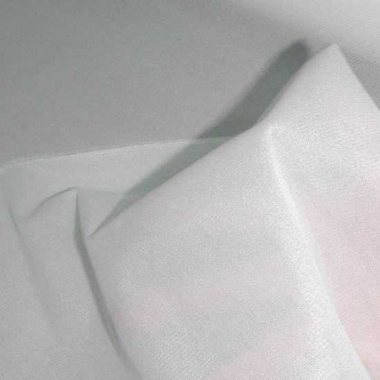 Knit Interlining fabric - Knit interlining with a hot melt face. This interlining is ideal for elastic or thin fabrics. The fabric is 75cm wide and its composition is 100% polyester.