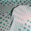 Chiffon Printed Green Polka Dots fabric - Beautiful patterned chiffon fabric with green polka dots interspersed in different sizes. It is a fabric with enough fall ideal for clothing.