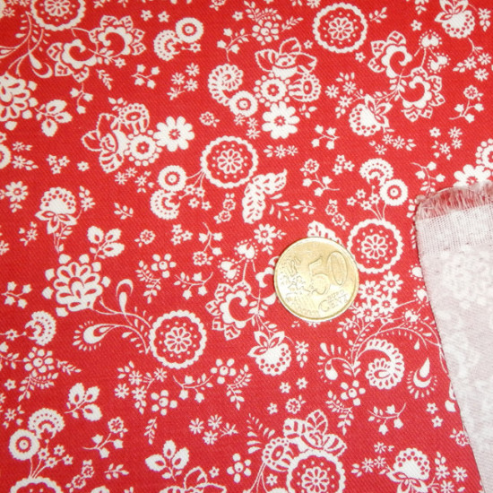 Tela Viella Flores Rojo Blanco - Tejido de Viella estampado con motivos florales blancos sobre un fondo rojo. La tela mide 150cm de ancho y su composición 60% poliester - 40% algodón.