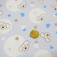 Pique Puppies Blue Hearts fabric - Pique fabric stamped with children's drawings of experts and hearts on a blue background.