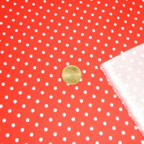 Pique White Polka Dots Red Background fabric - Pique canutillo fabric with small polka dot print on a red background. The polka dots are approximately 3mm. The fabric is 160cm wide and its composition 65% polyester - 35% cotton